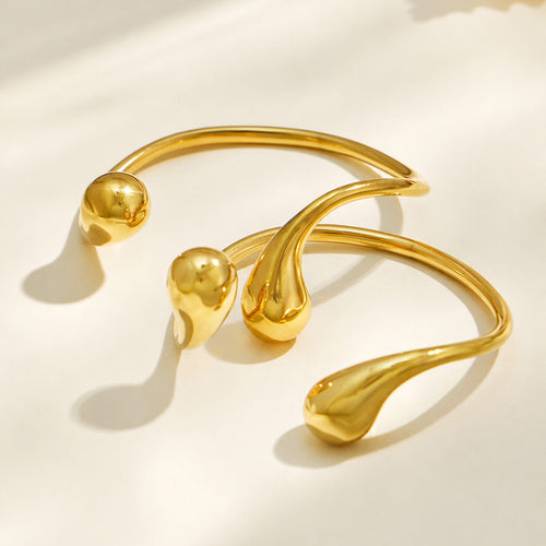 Thalassa open cuff bracelet shown from the side, adjustable to fit most wrists
