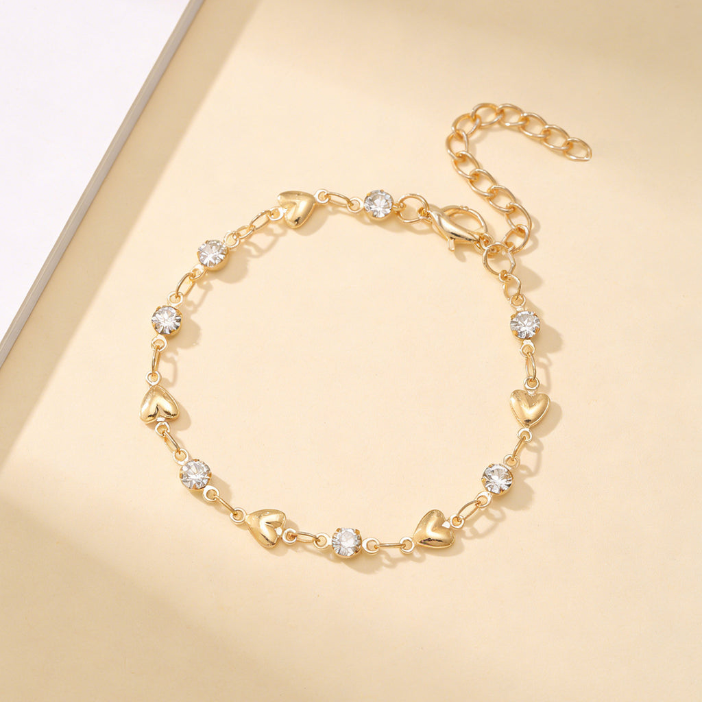 Venus heart charm bracelet shown with its adjustable cable chain and clasp